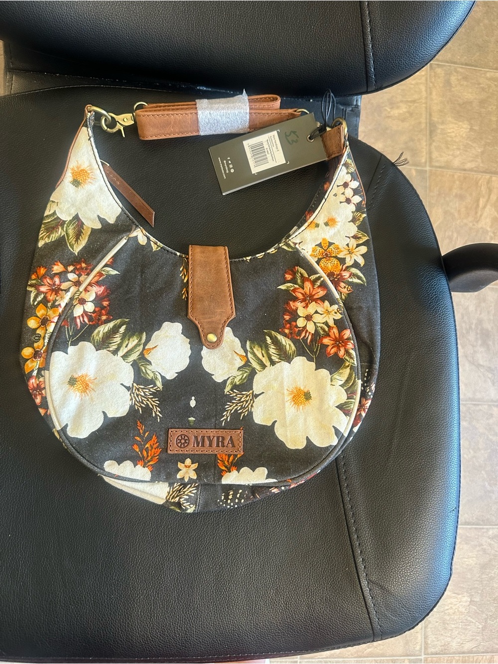 Myra Bag Black Floral Crescent Shoulder Bag with White and Orange Flowers